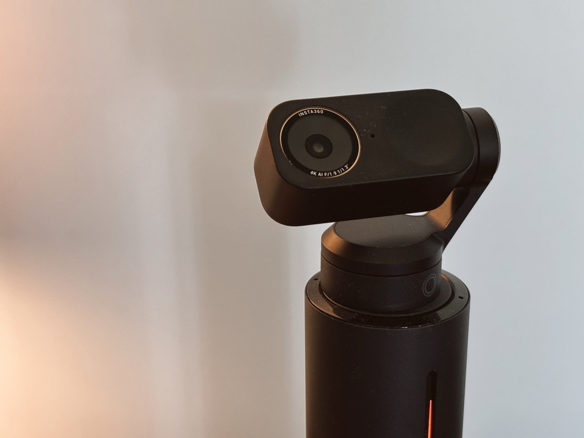 Close-up of Insta360 Link 2 Pro mounted on Insta360 Flow stand for AI video tracking