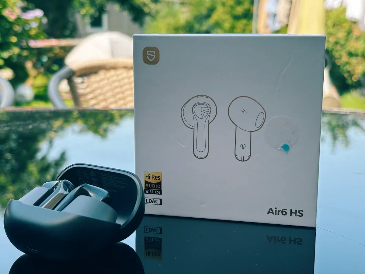 SoundPEATS Air6 HS earbuds with charging case and product box, showing Hi-Res Audio and LDAC support.
