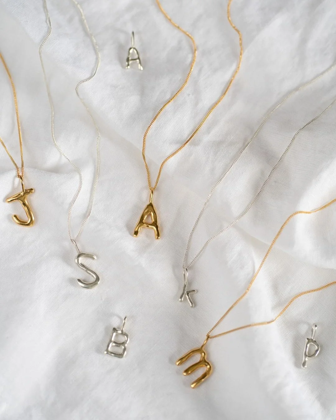 🖤 N E W 🖤 Molten Initial Charm necklaces!
Excited to finally announce online my molten initial charm necklaces. 

Available in small, medium and large sizes, mix and match a combo for all your loved ones, and layer with other special necklaces. 

E