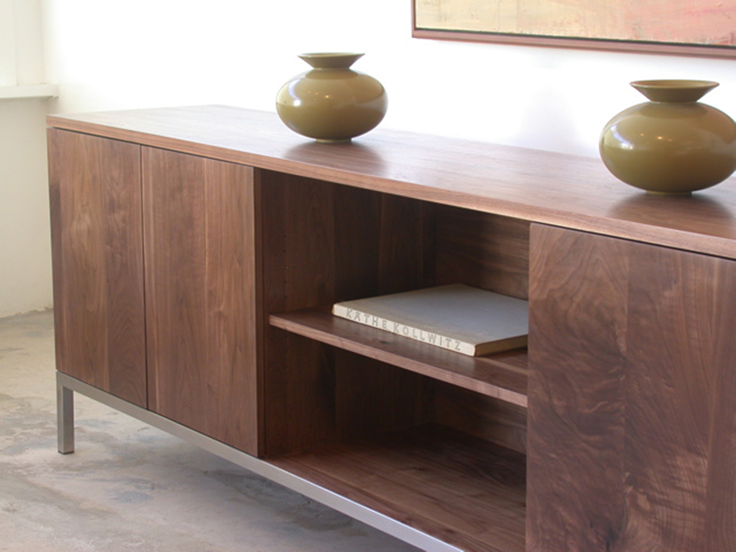  shown in solid walnut 