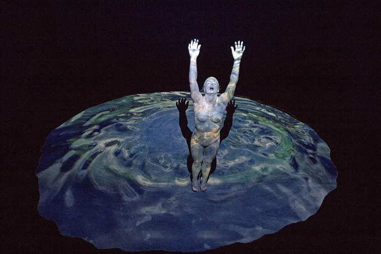 Birth/Geyser , 2013 Oil on Resin and Interactive Video Projection, a collaboration between Carole A. Feuerman & Michelangelo Bastiani, Dimensions Variable. Courtesy of Jim Kempner Fine Art