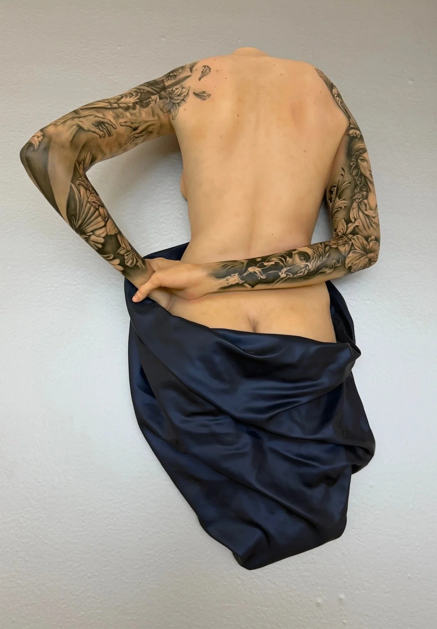 TOWEL ON BACK WITH TATTOO