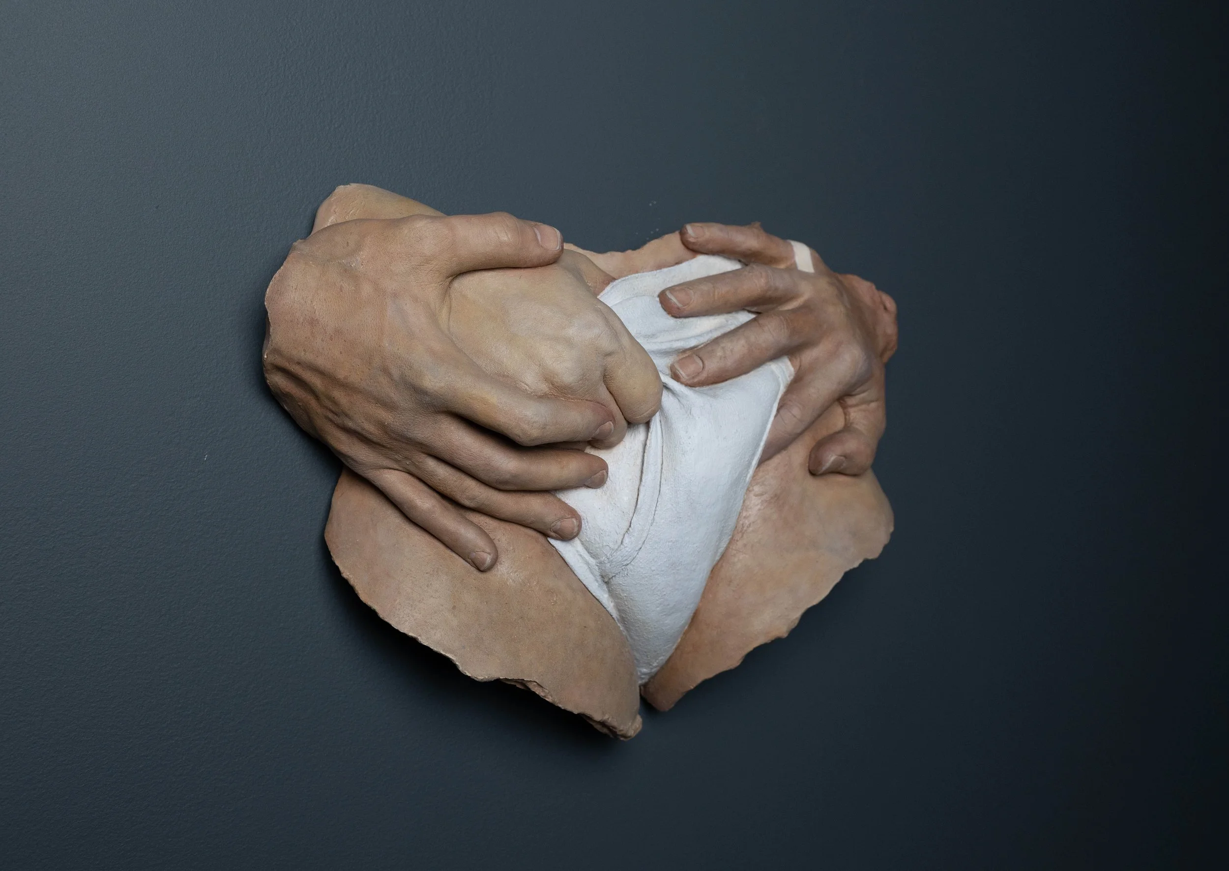 Three Hands

 

 1976 | 12 x 14 x 5 in (30 x 35 x 12 cm) | Oil on Resin | Palazzo Bonaparte, Rome, IT 

 Reaching through the void—connection, tension, and the human need to hold on. 