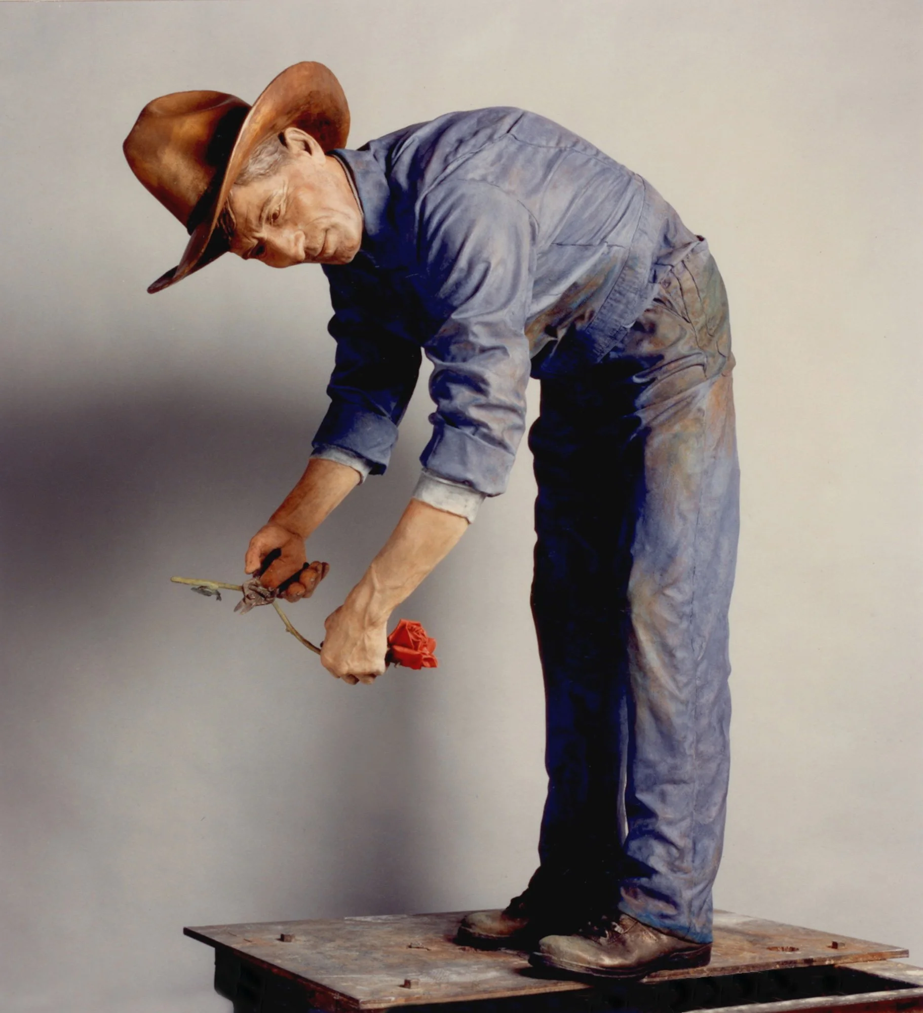  THE GARDENER OF CAROLWOOD 

 

 1993
52 x 25 x 30 in (132 x 64 x 76 cm)
Oil on Resin 