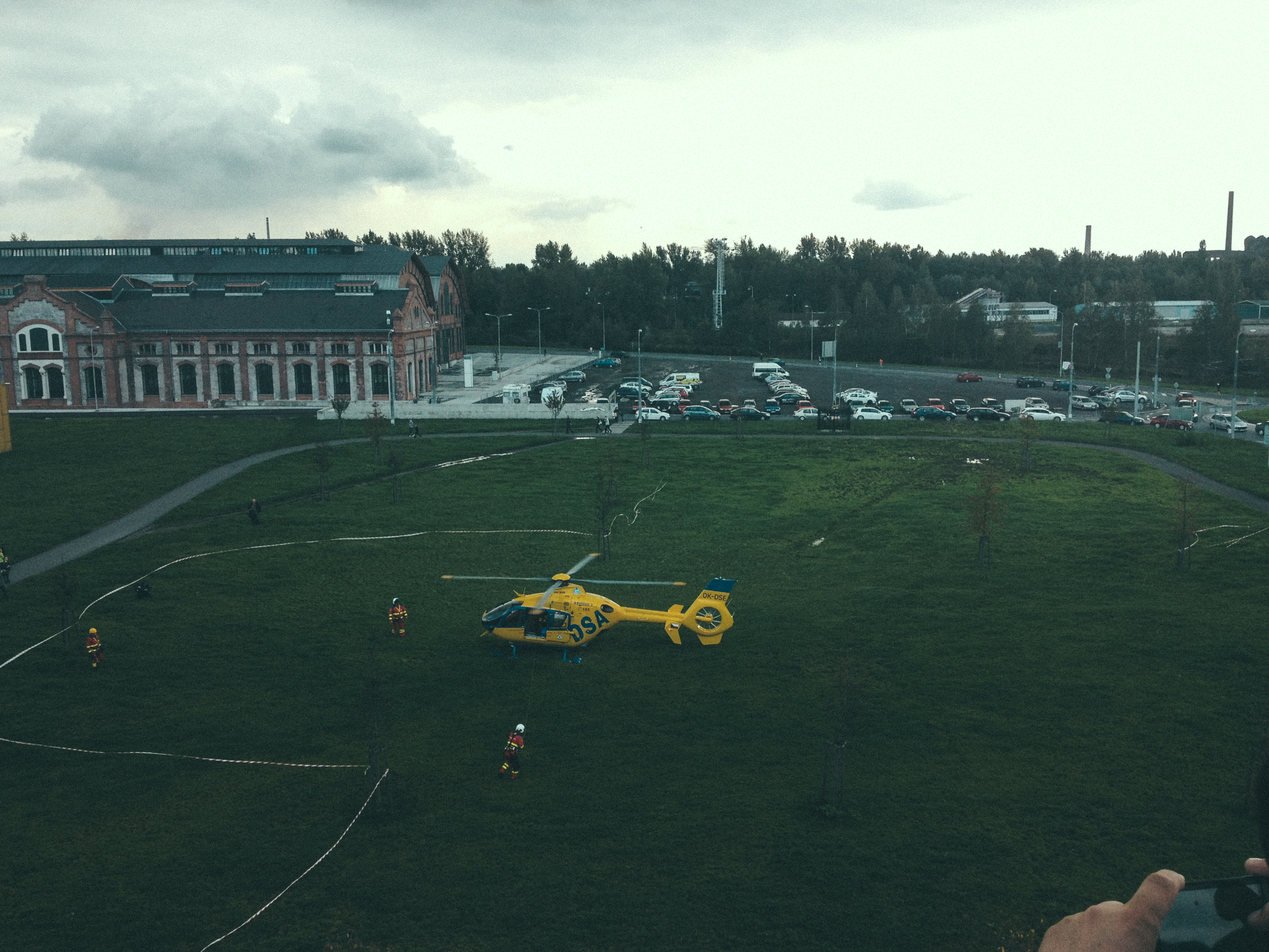 This helicopter landed in the grass right outside of the mall. I have no clue why.