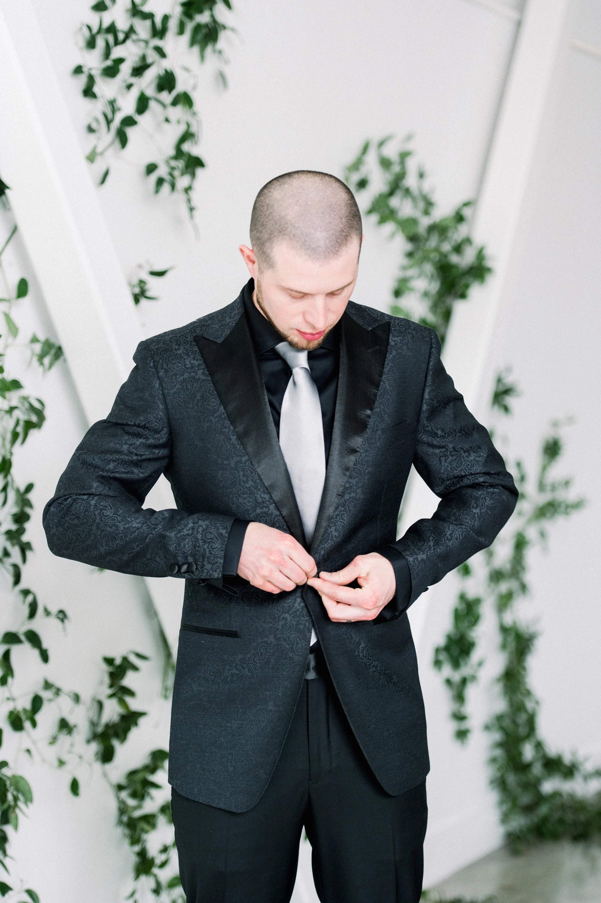 groom black ob black tux from Hive & Colony | Artists for humanity wedding | Boston wedding | green botanical wedding