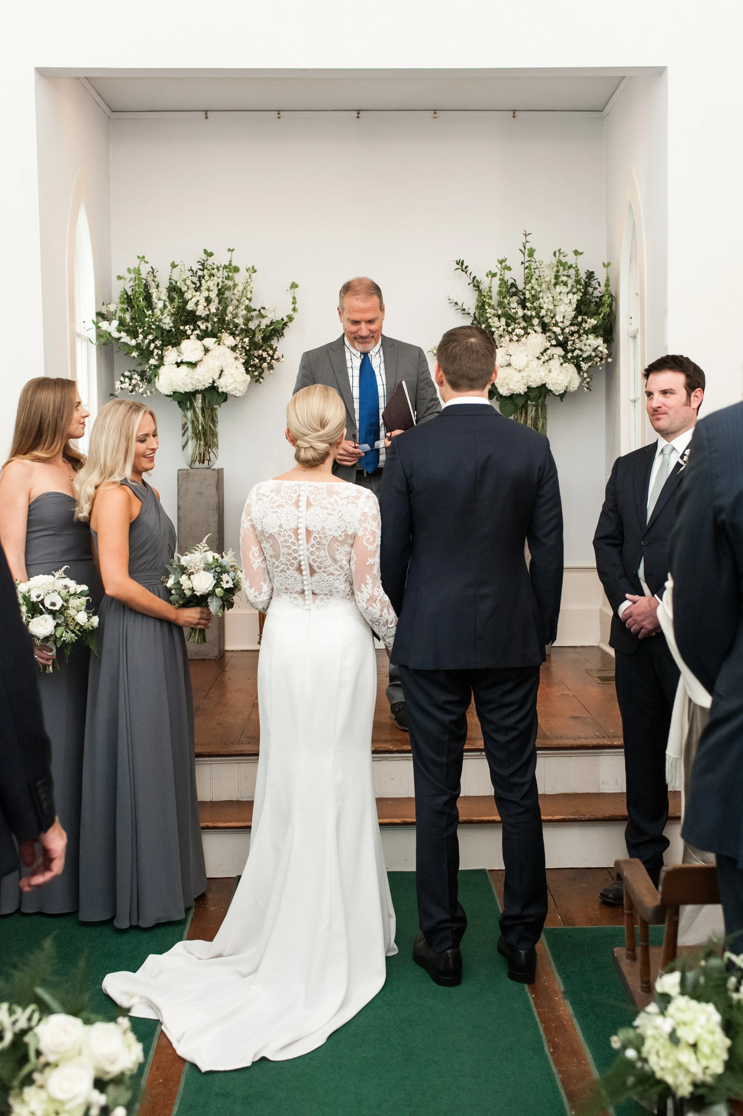 Wee Burn Beach Club Wedding Darien CT Talmidge Hill Community Church Wedding Ceremony bride and groom say I do and exchange rings and vows