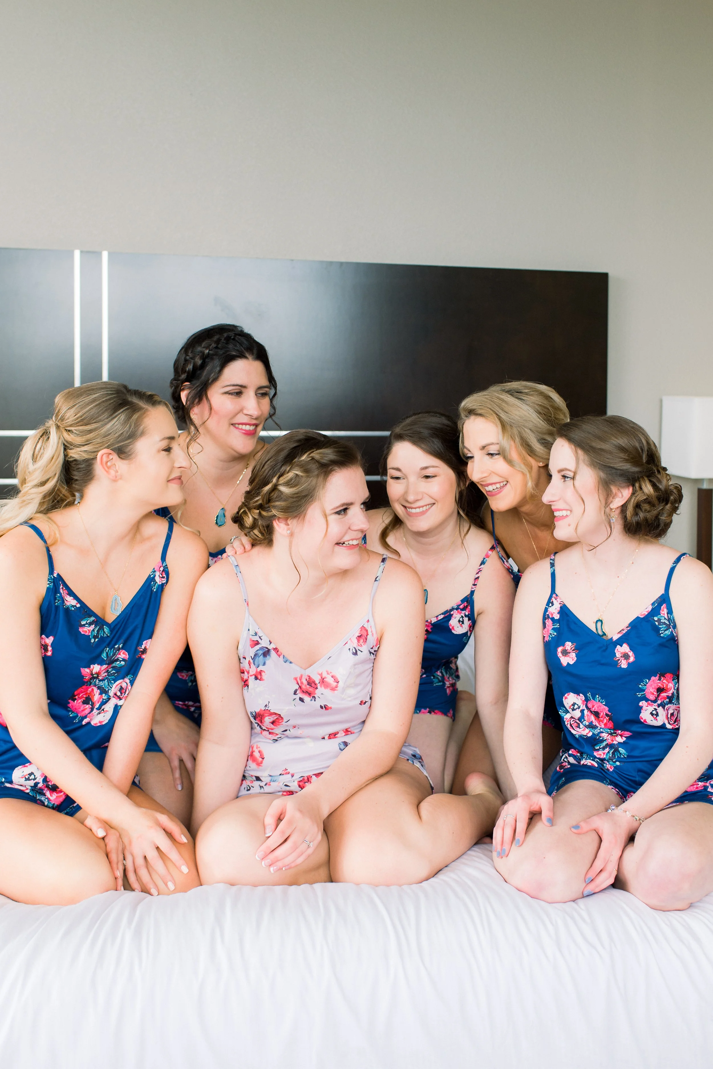 The Villa at Ridder Country Club Spring Wedding East Bridgewater MA bridesmaid floral pajamas in blue and lavender