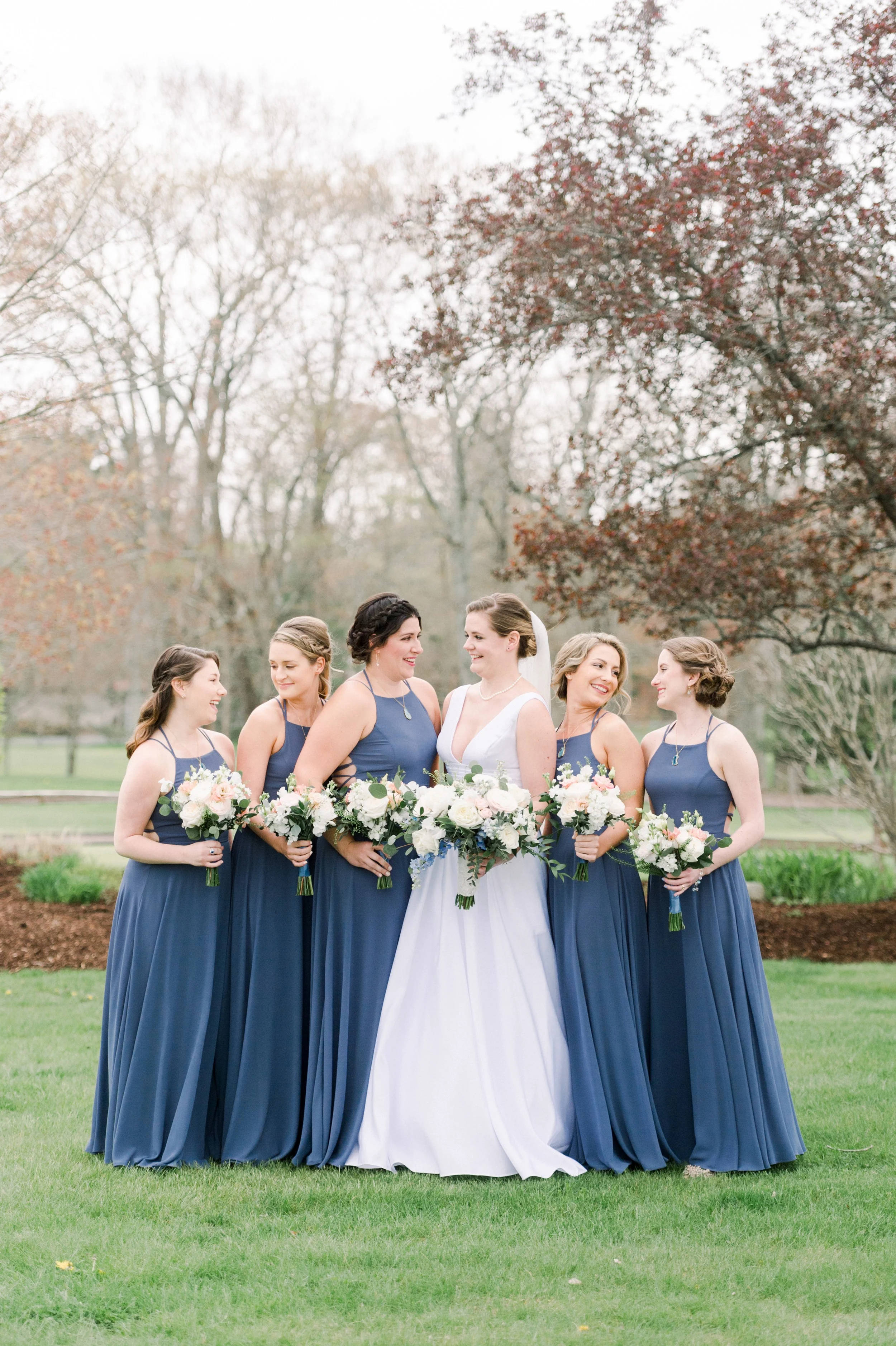The Villa at Ridder Country Club Spring Wedding East Bridgewater MA First Look dusty blue bridesmaid dresses bridal party portraits