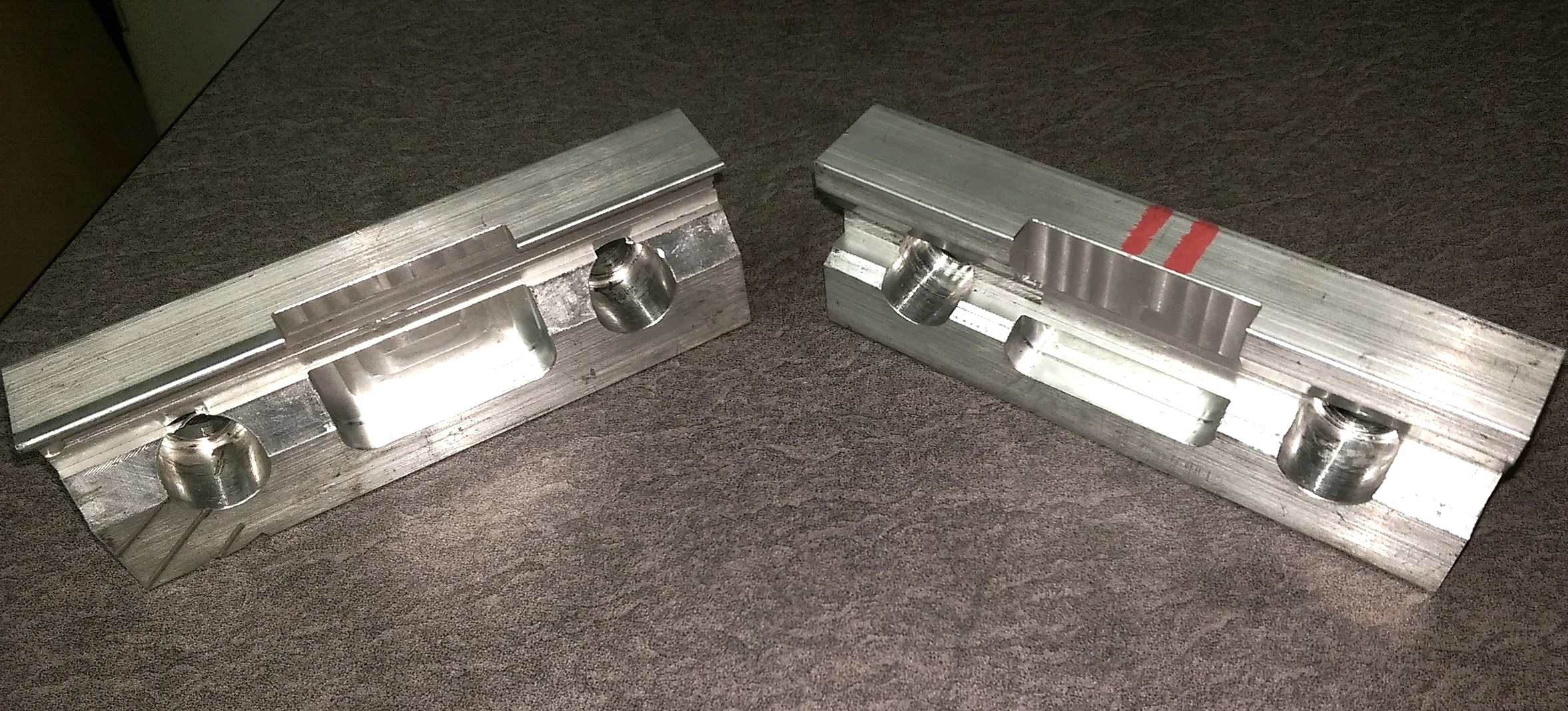 These are the front and back vise jaws removed from the vise; they were machined from solid aluminum.