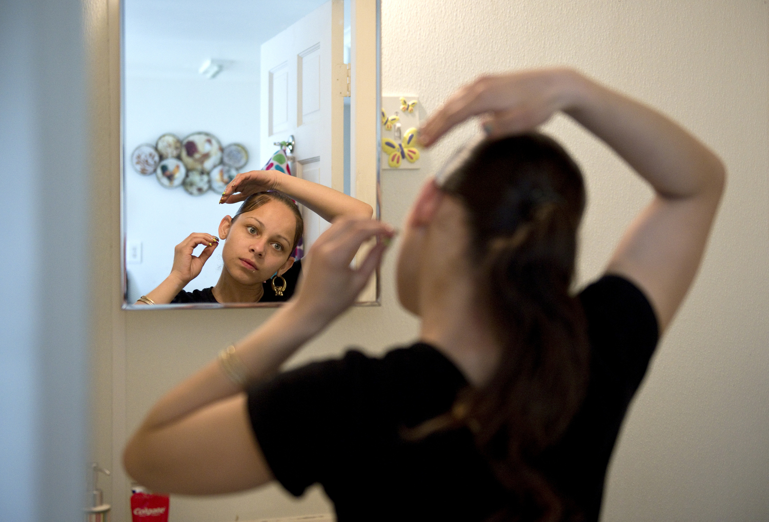  "To me, a fighter never gives up," Sarita&nbsp;said as she got ready for work. "At my job there's days which I wanna quit and go back to my mom's. And I stress a lot about bills because I'm doin' everything on my own. So like to me, fighting is like