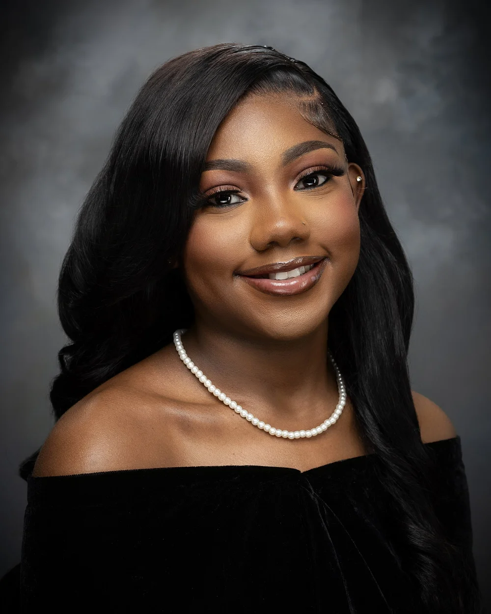 Classic senior yearbook portrait with pearl necklace