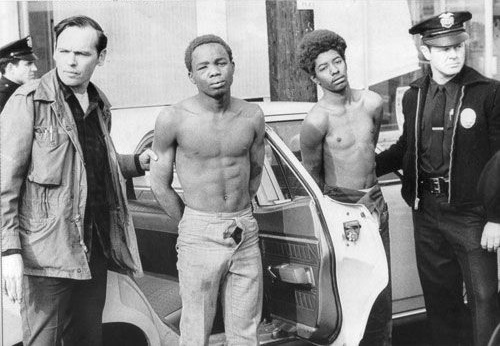 LAPD officers arrest Black Panther members after raid on the party headquarters December 8th, 1969.
