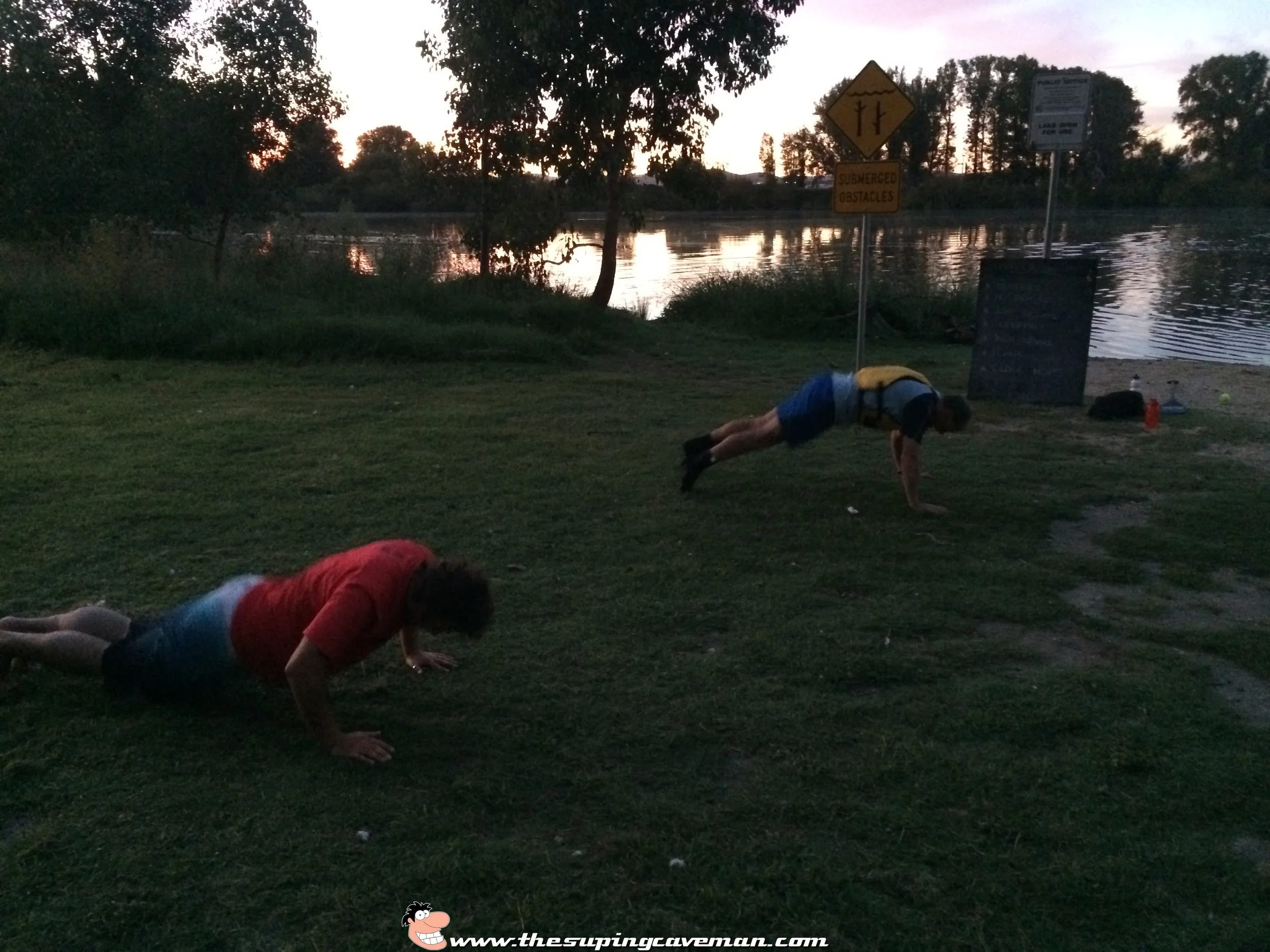 Capital SUP paddlers Aidan Lewis and Jon Bell getting their Burpee on