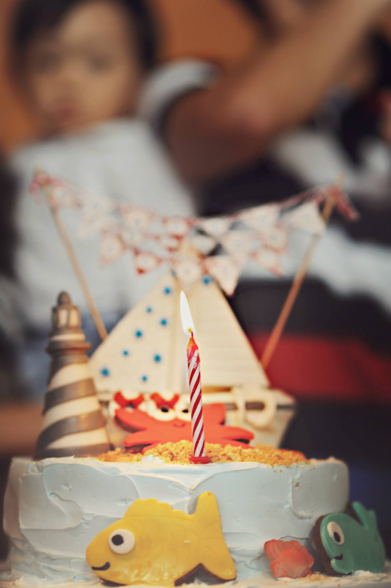 nautical birthday party cake with boat and fish