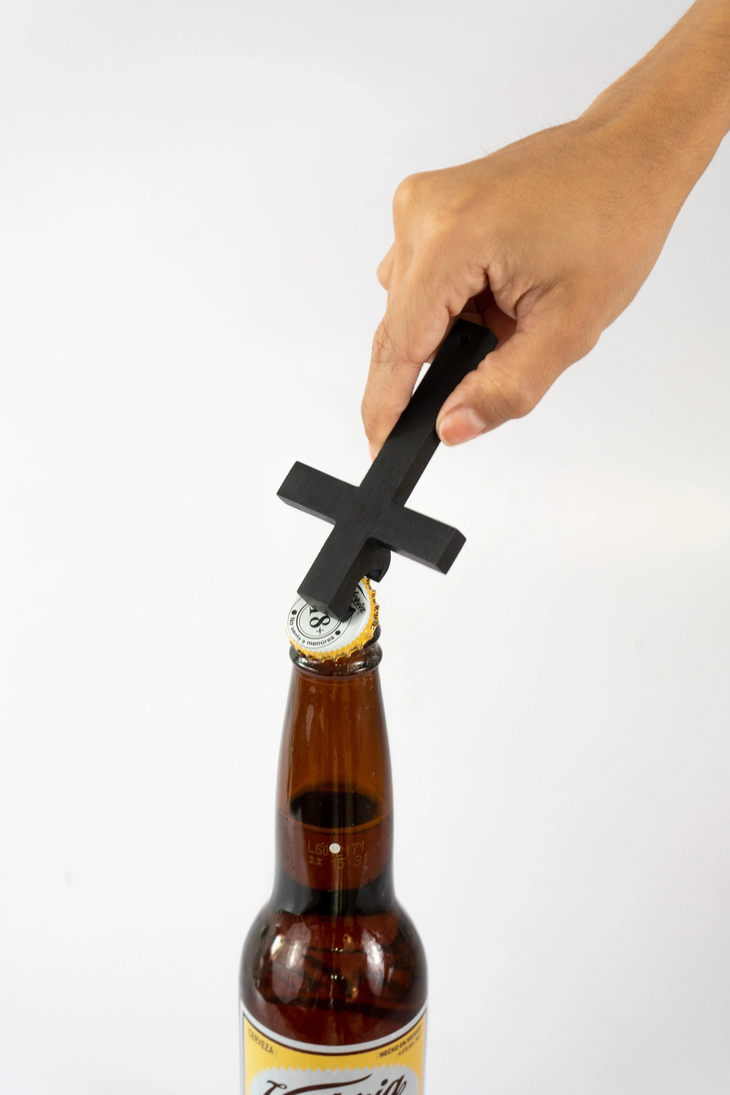 Destapador de cruz