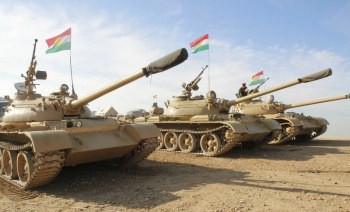 Kurdish Peshmerga troops and tanks. Photo: Reuters