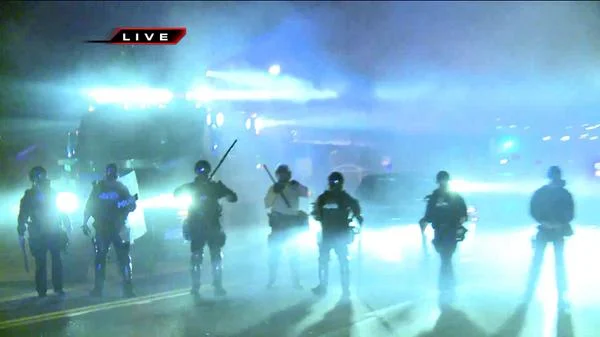 Wall of high beams facing anyone approaching Ferguson, Missouri.