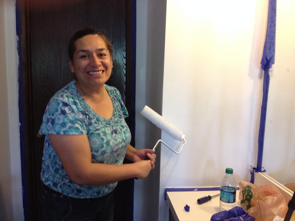  Noticing we had more paint than we needed for the room, Juana applied two new coats to an alcove connecting the bedroom to the bathroom. 