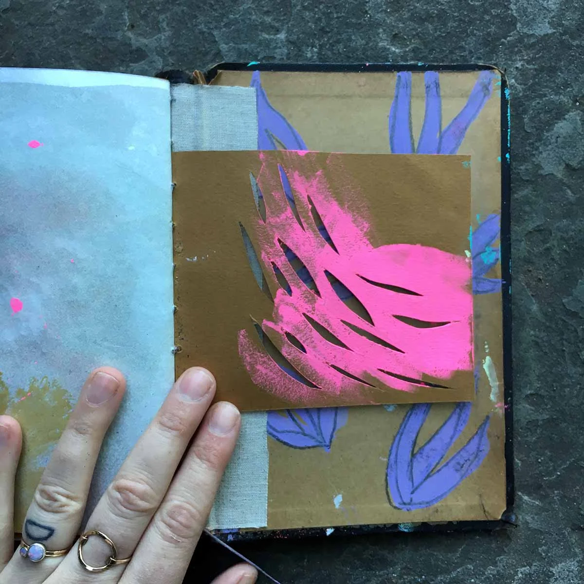 Cutting with an x-acto, painting.