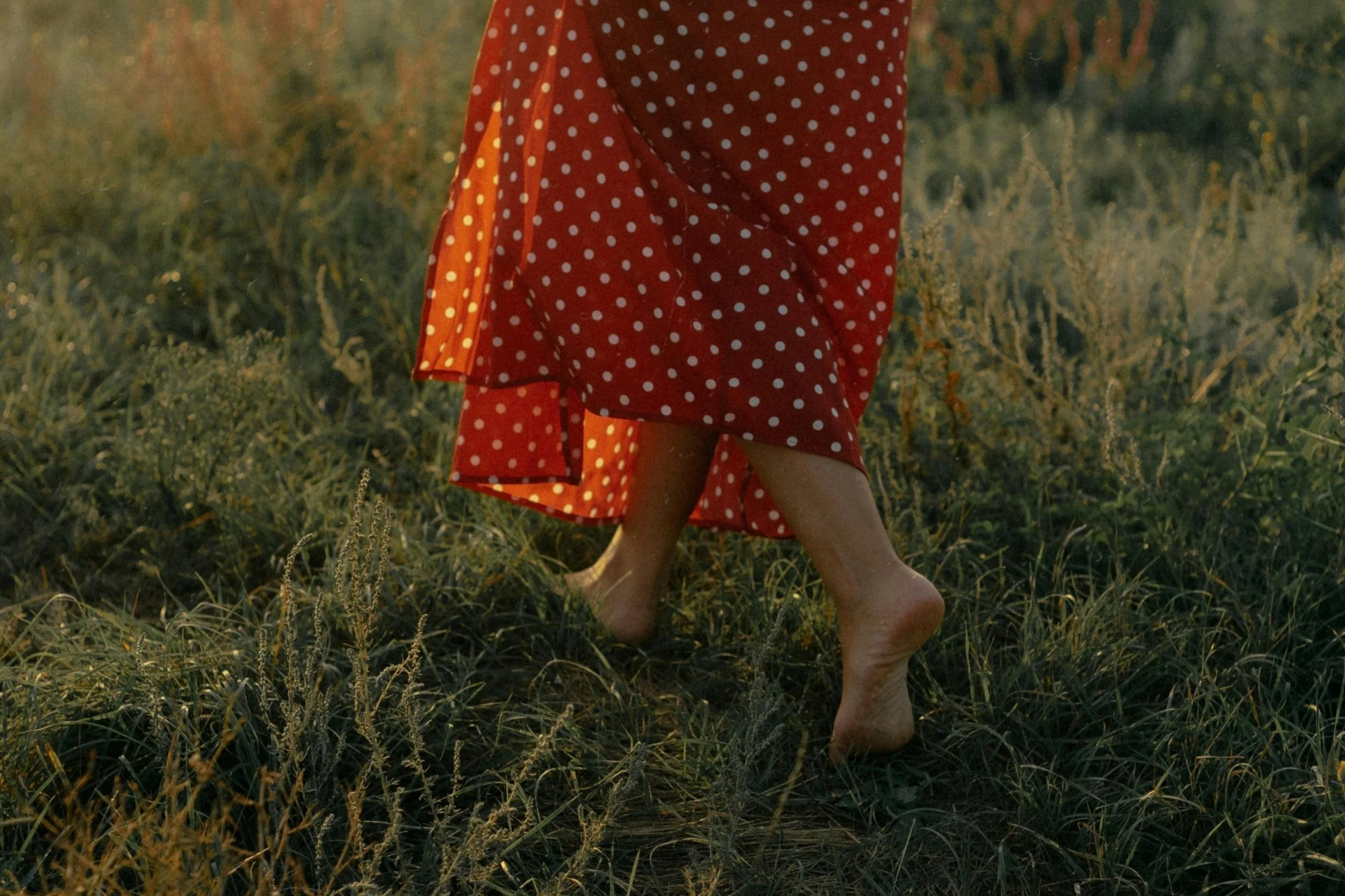 grieving Woman walking barefoot after grief therapy in oregon