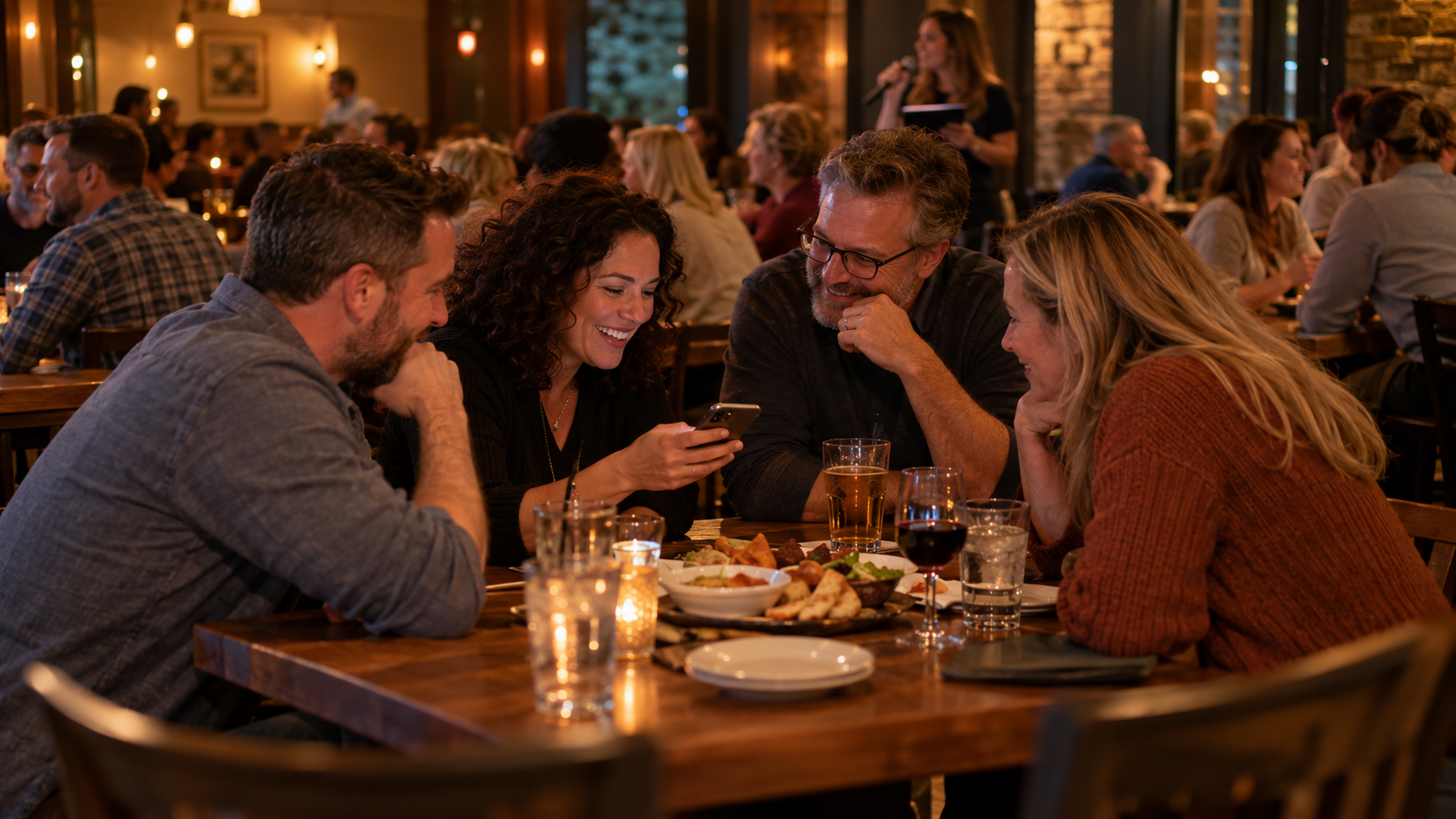 Illustrative scene of friends enjoying team trivia and appetizers in a neighborhood restaurant