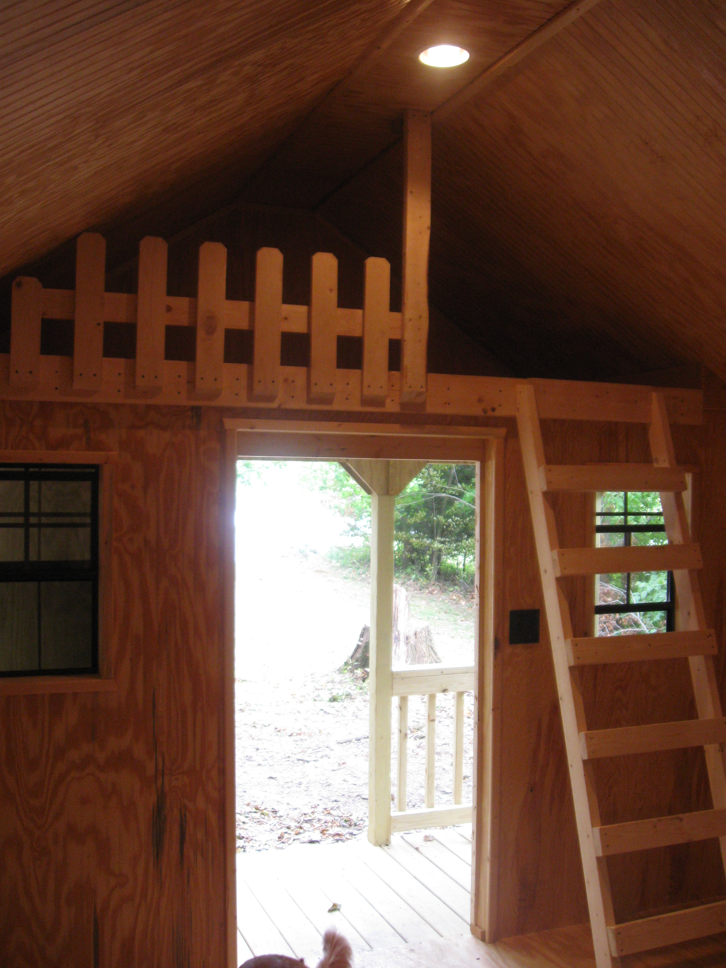 Loft bed above the porch is a great place for the kiddos!