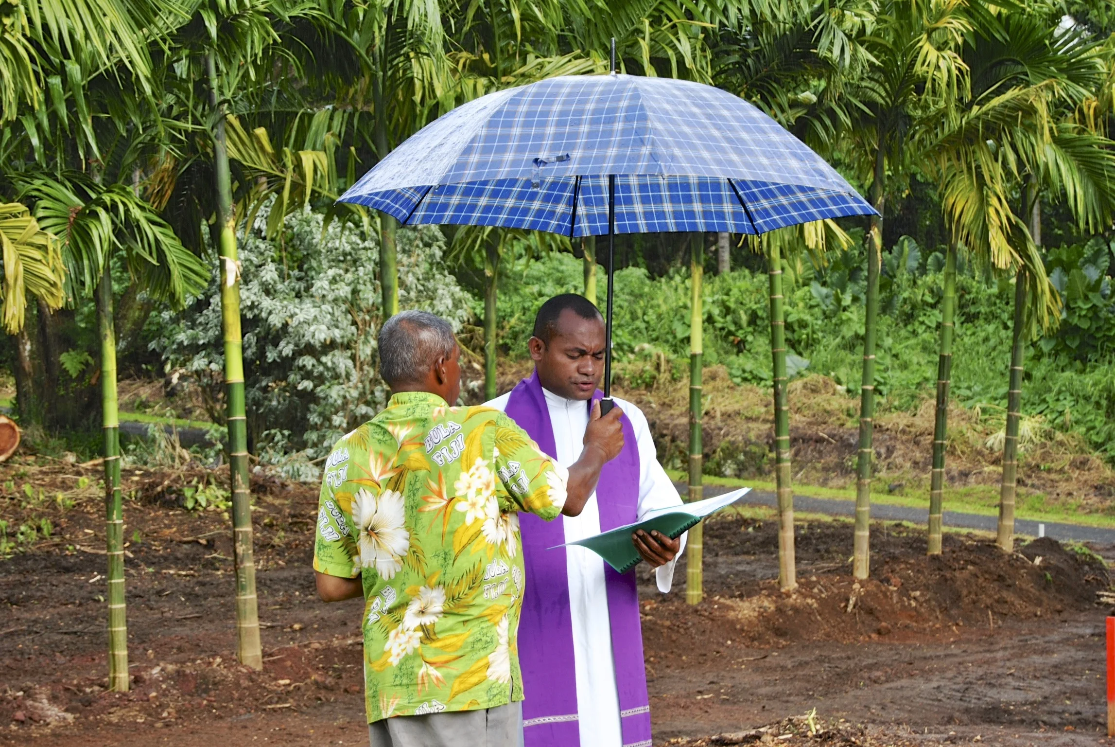 Father Petro Eparama Matairatu blessing the project site.
