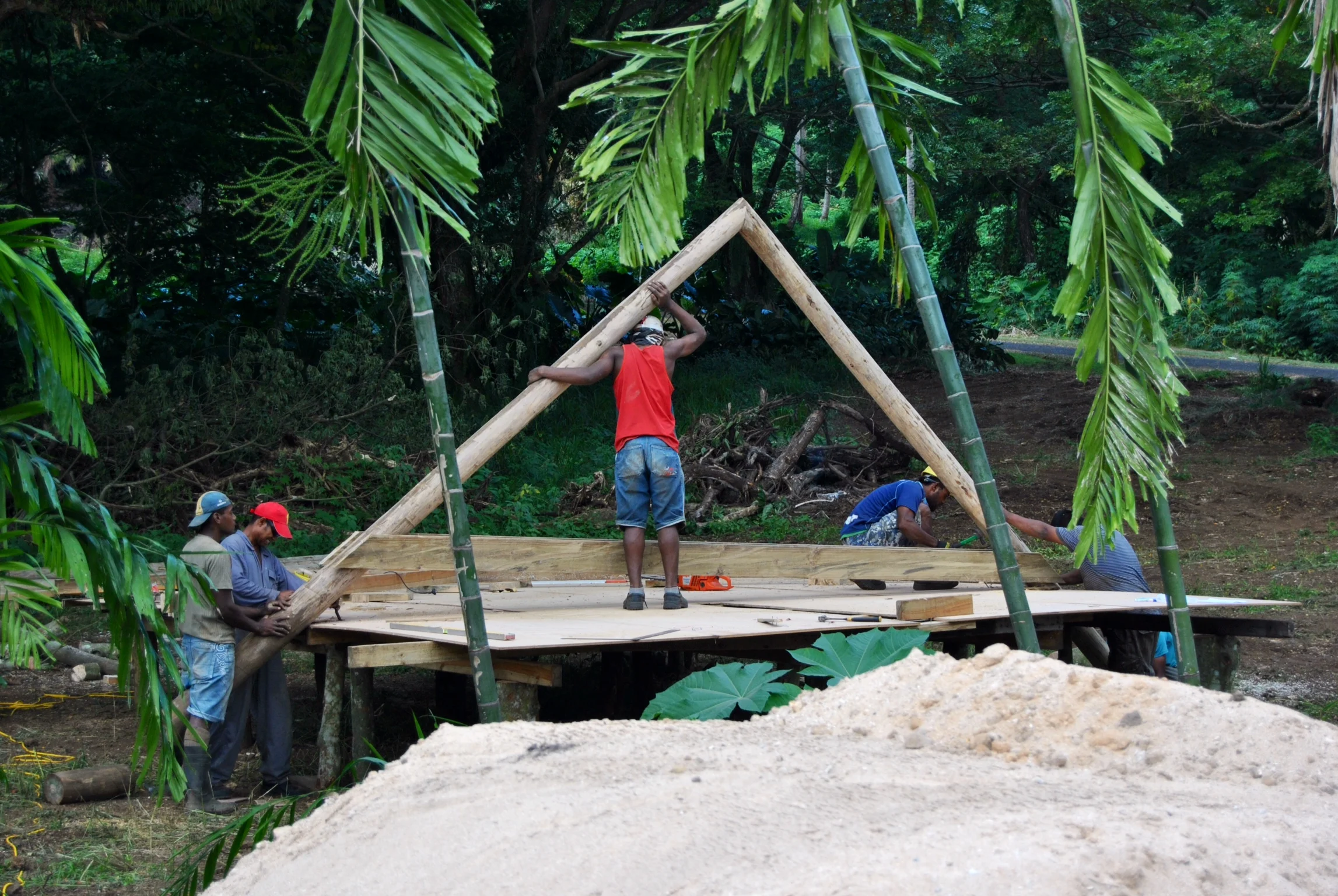 Truss construction is being performed onsite. The skill of the craftsmen is exception. Nice work guys!
