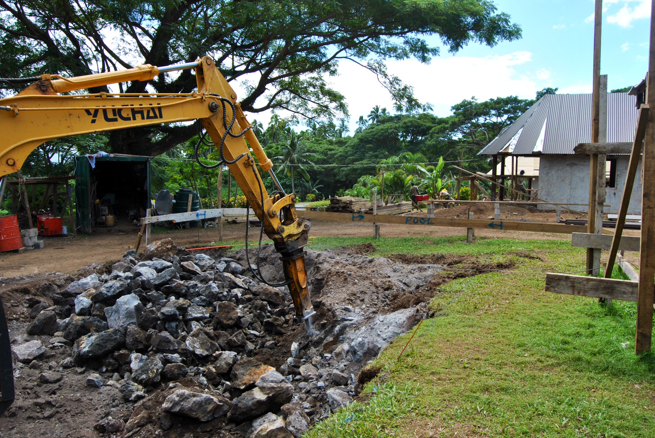 Oops! So, have you ever hit a lava tube during the installation of a swimming pool? Well we did, and all I can say is let's hear if for the yellow iron! I suspect the rubble will be put to good use.