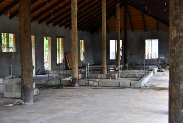 Floors have been poured inside the Salty Fox, and the concrete block is being set for the bar and interior walls.
