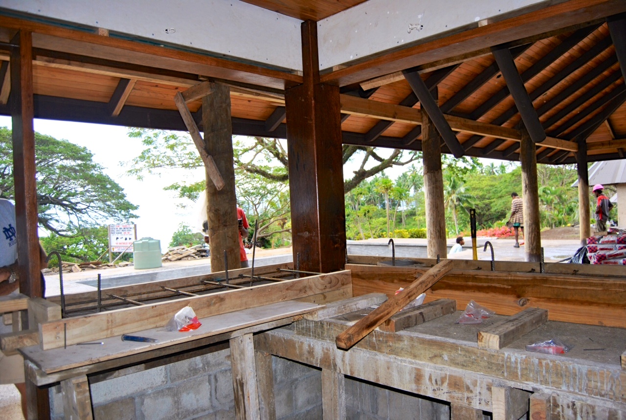 Here is the view looking towards the pool, and into the background, the Somosomo straits. They are starting to form up the bar so it can be poured, polished, and sealed. How do those wood finishes look?