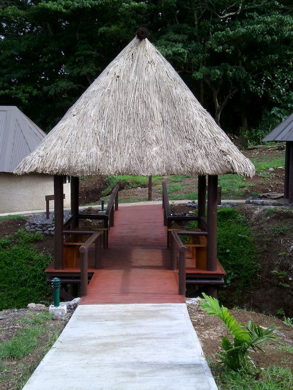 The bridge and Olo. The Olo is a semi-private area to gather, discuss the latest gossip from the coconut wireless, and enjoy the views offered by the landscape.