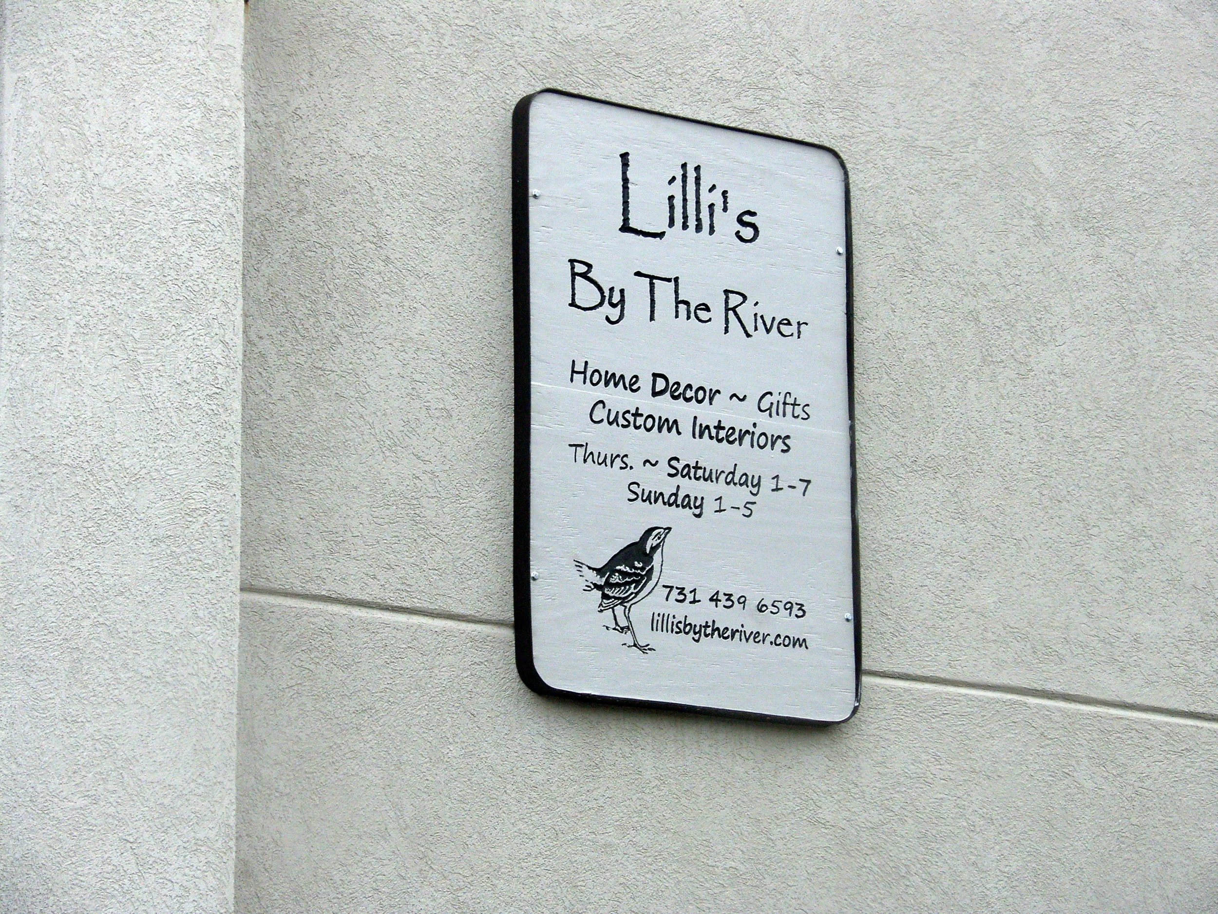 Custom sign, metal frame and material provided by customer.  Design & Carving Cost: $150