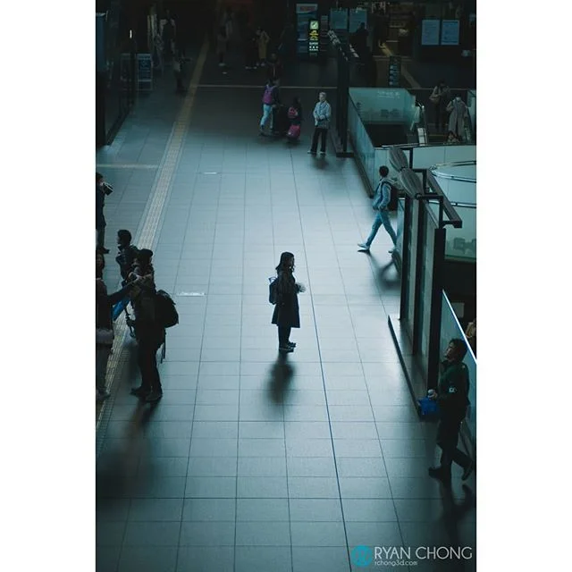 Kyoto Station. It was still morning when I got to Kyoto station and I wanted to shoot photos of the people walking around. I went up to the 2nd floor in the West side and then set up my camera facing down to the crowd walking by. After about 10 to 15