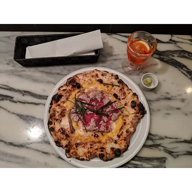 Pizza Y at Savoy Tomato-to-cheese in Azabujuban, Tokyo. Made by pizzaiolo, @yuki.motokura . If you've watched Ugly Delicious on Netflix (and if you haven't, go watch it), you might recognize this from the first episode. It is a weird but delicious co