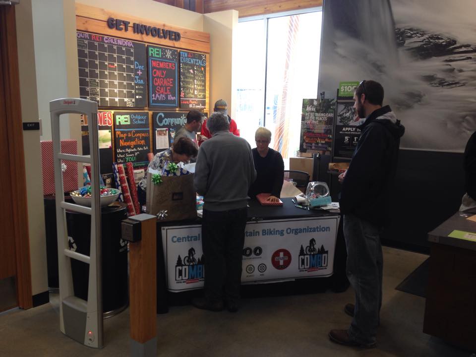 Gift wrapping at REI - Grey shirt in action!