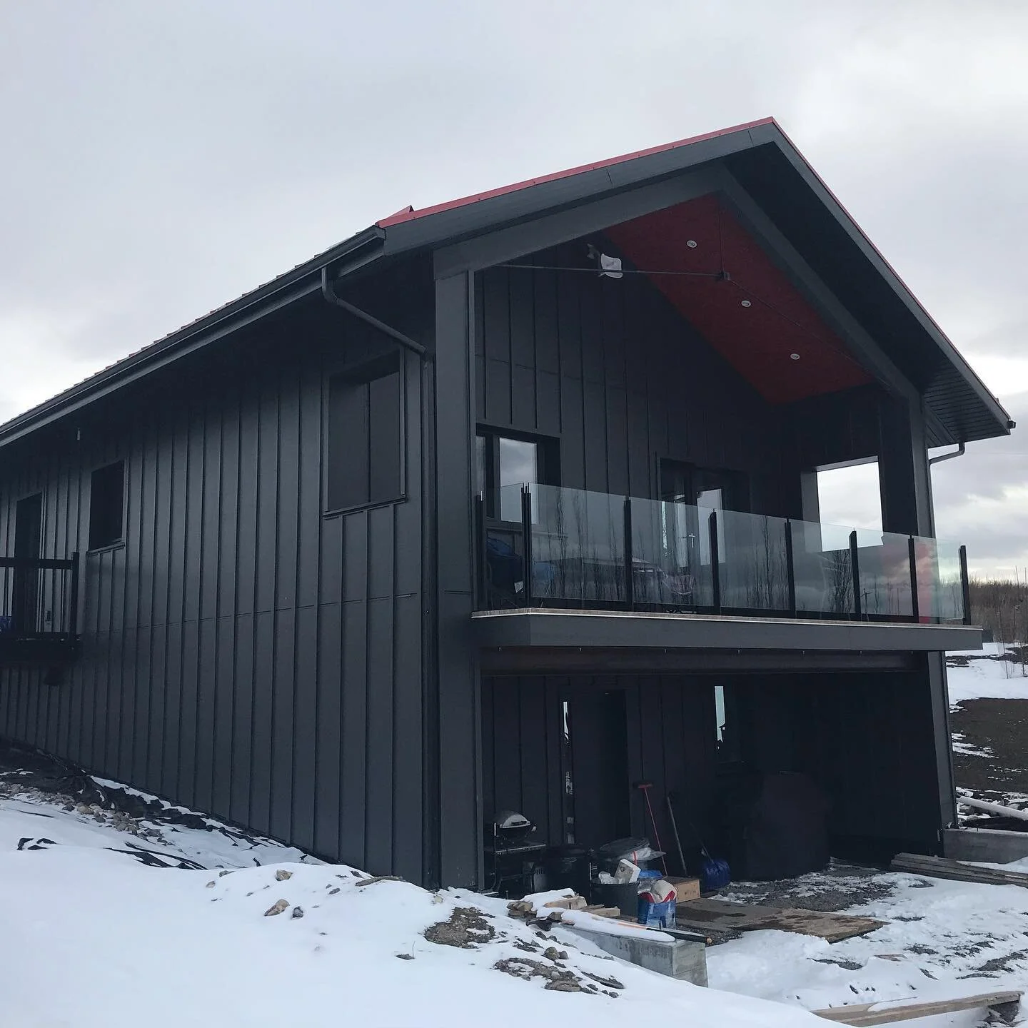 Some new photos of the passive solar house show how carefully constructed it is as well as  being a bold form on the landscape. The owners are enjoying the amazing comfort of a home that never loses warmth in winter, maintains cooler and comfortable 
