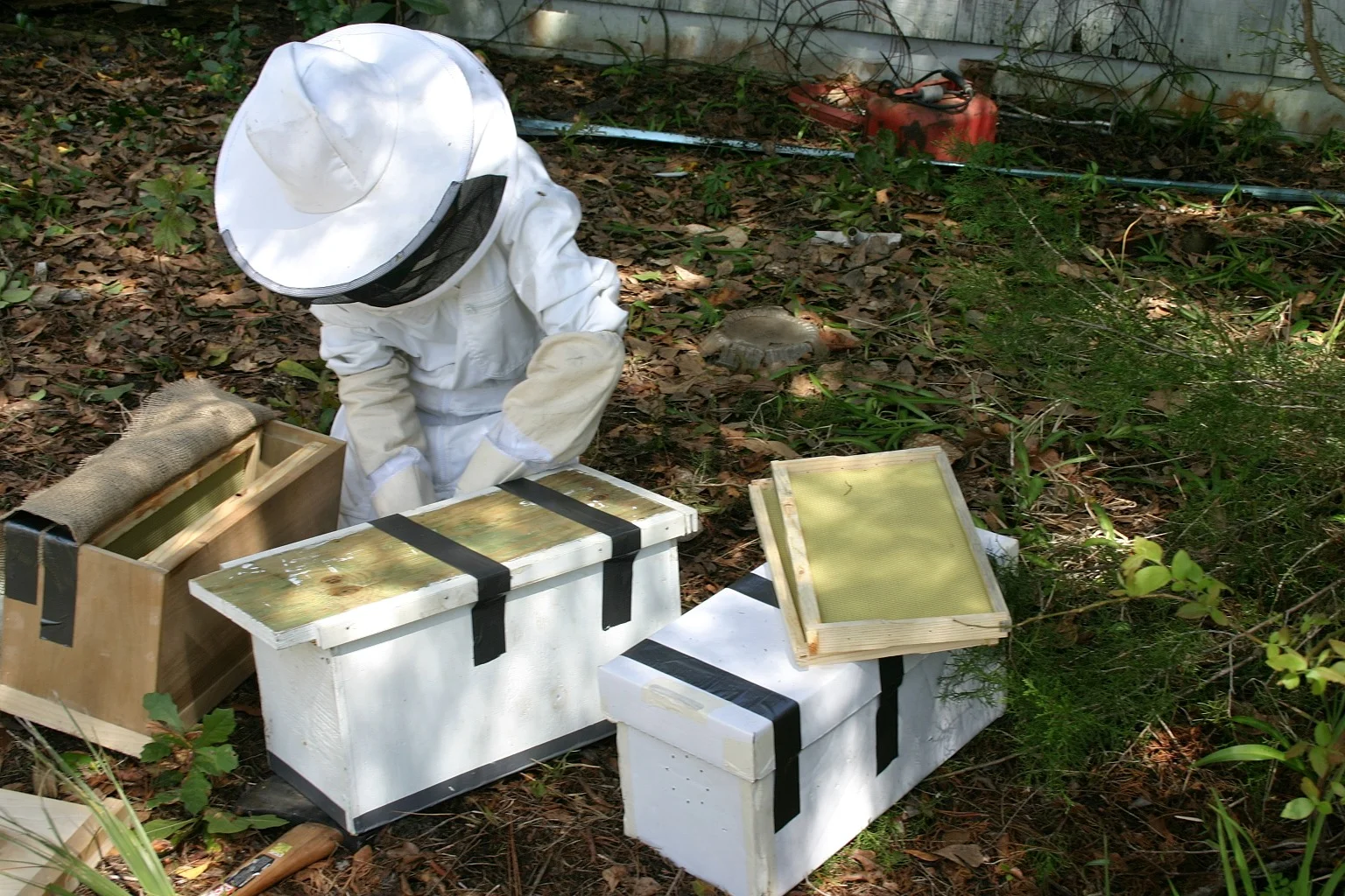  With whatever materials available, we prepare the beehive boxes for travel.&nbsp; 