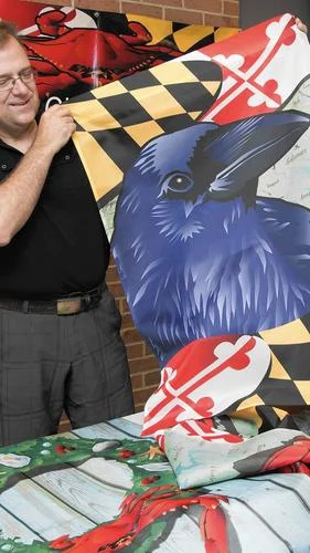 Joe barsin of citizen pride and his maryland raven house flag. -- PHOTO BY JOSH MCKERROW.