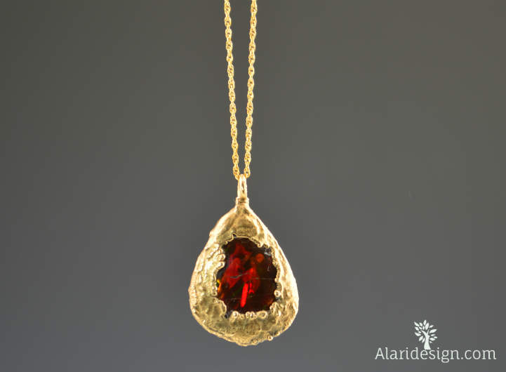 Fire Agate, electroformed in gold.