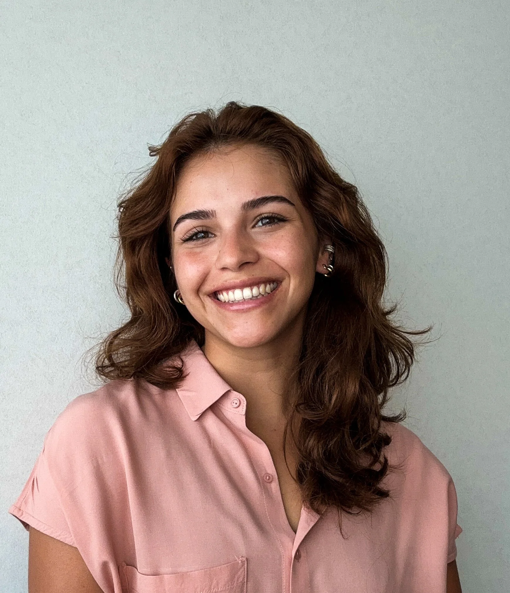   "I believe singing feels best when approaching it with a body-aware approach, helping my students connect breath, mind, and voice. I focus on establishing a grounded foundation: from noticing posture changes to releasing lingering tension in the bo