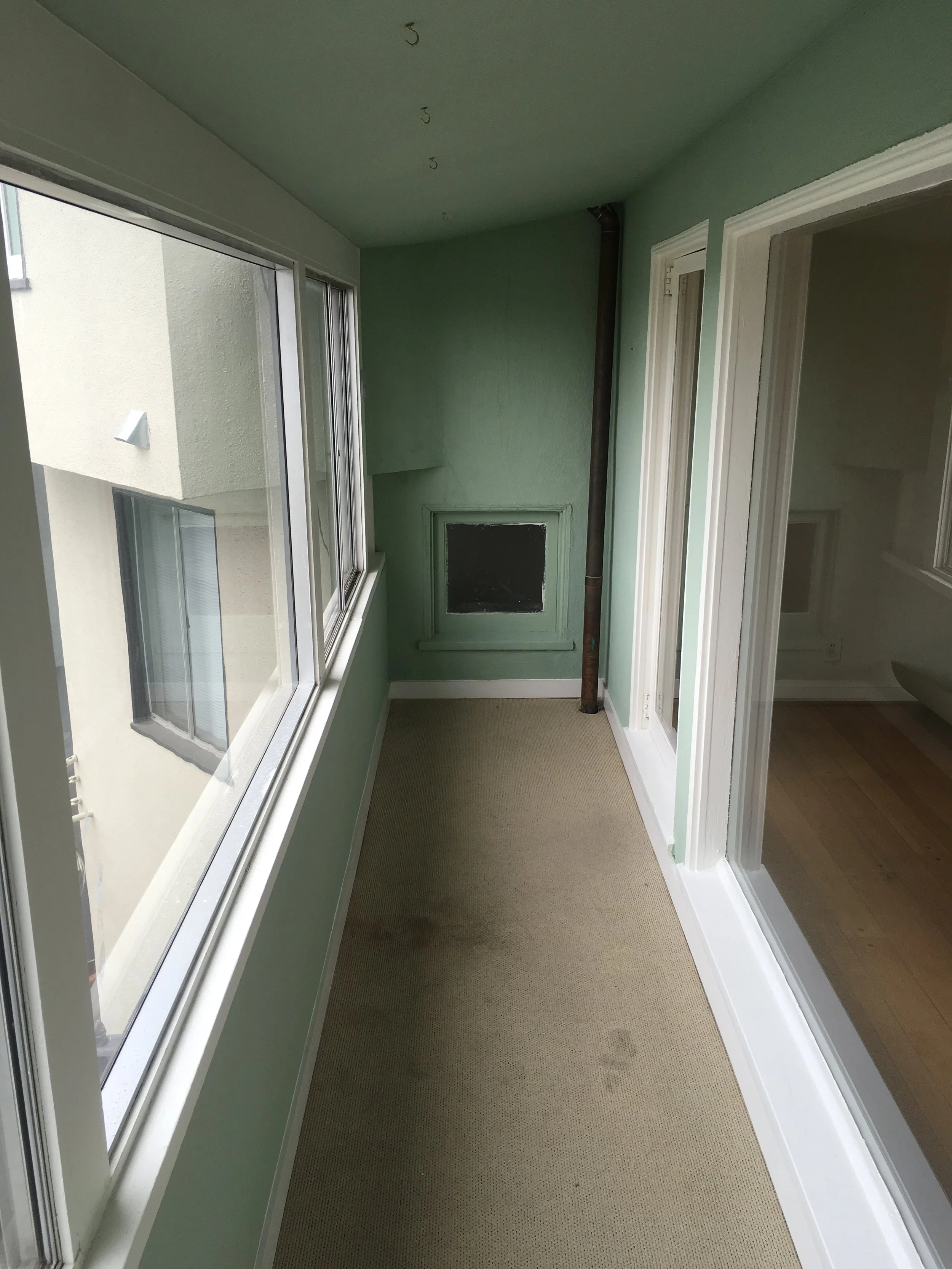 Before removal of interior porch, installation of new window and finishes: San Francisco