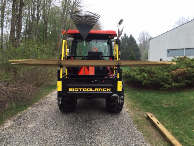 Bigtoolrack on a Kubota 3560 using the Lumber Hooks to install a Split Rail Fence