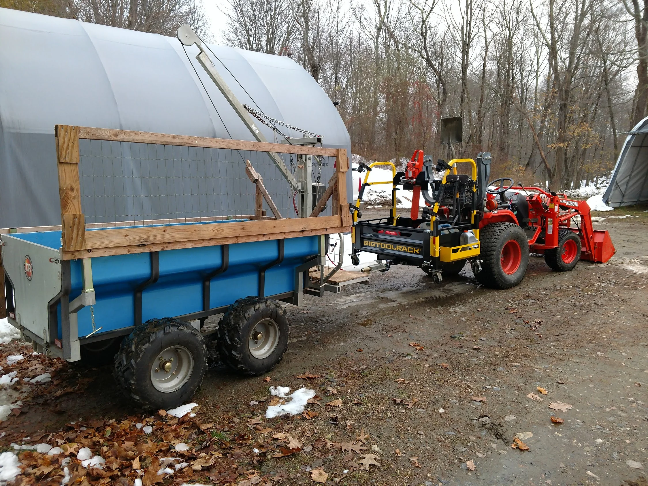 Bigtoolrack on a Kubota pulling a DR trailer