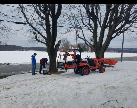 Dale maple sugaring with his new Bigtoolrack