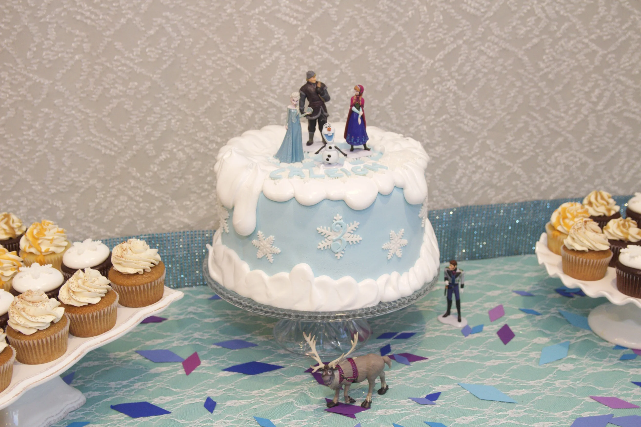 Vanilla cake filled with triple berry jam and Nutella topped with fondant and homemade marshmallow frosting