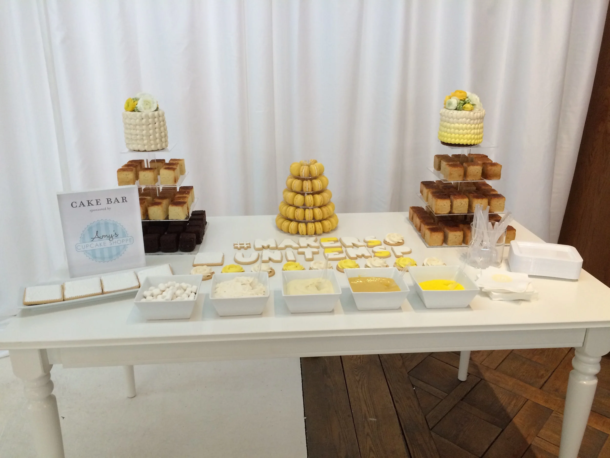 My very first cake bar! Includes cake cubes and assorted toppings, custom sugar cookies and a macaron tower