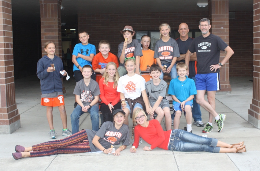 Back row: Natalie (Thing 2, v2.0), Sam, AJ, Asher, Wyatt, Rilynn (Thing 1, v2.0), Head Coach Steve Cowdrey, Coach Paul. Middle row: Kyler, Mary Ann, Taylor, Joey, Ryker. In front: Maia, the original Thing 2 (Left) and Carmen, the original Thing 1 (right.) Picture courtesy of Suzy Cowdrey.