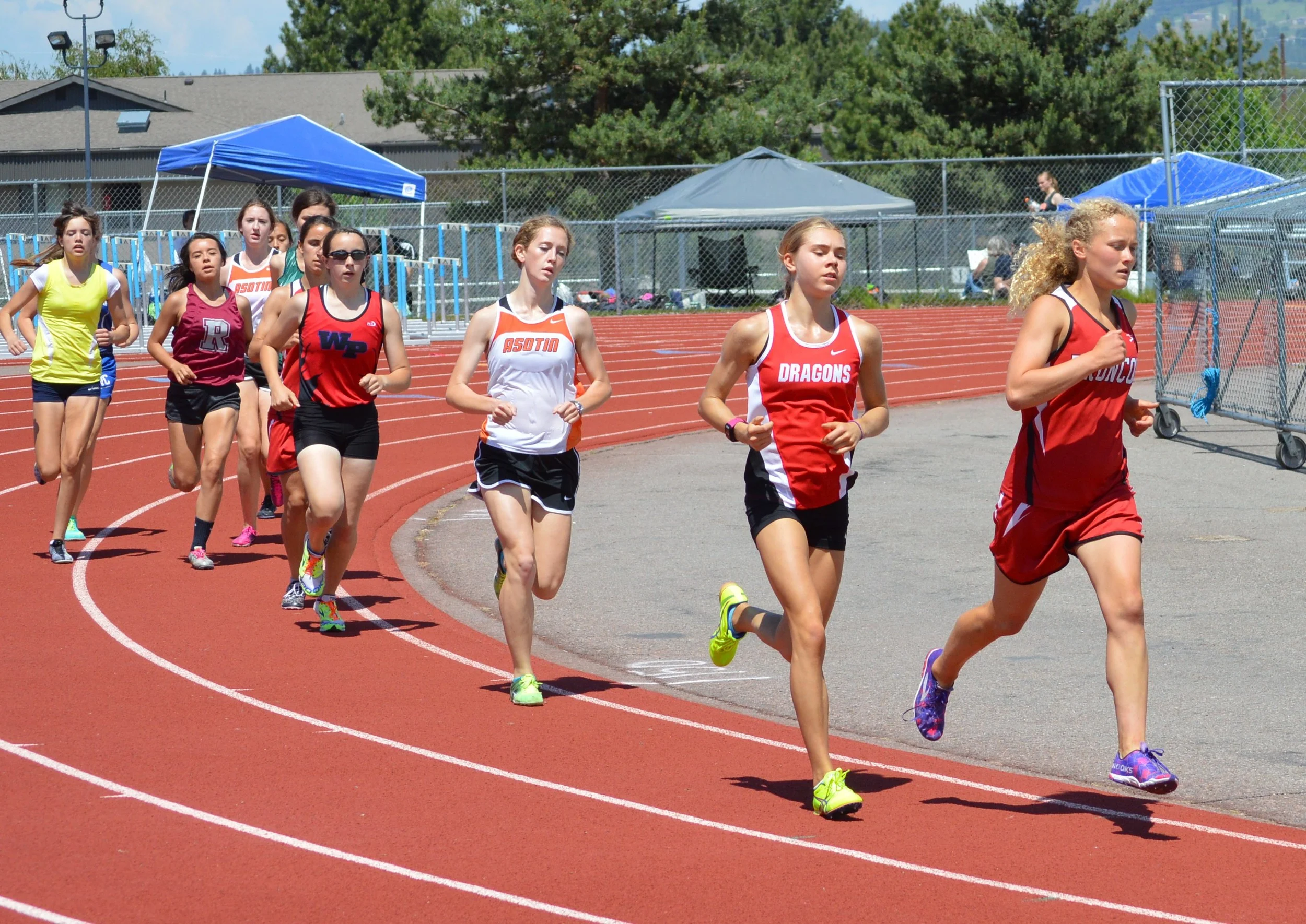 Tracy Melville of Lind-Ritzville leads the 3200M with Marika Morelan (St. George) challenging her. Lucy Eggleston holds a steady third with Waitsbury-Prescott's Emily Adams grabbing fourth.